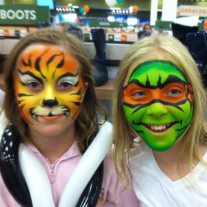 Yellow and Orange Tiger and Ninja Turtle Face Painting