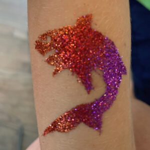 red and purple glitter tattoo shark